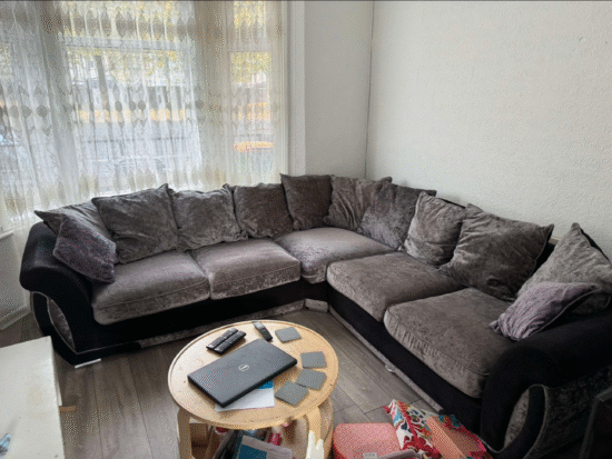 Grey and black corner sofa