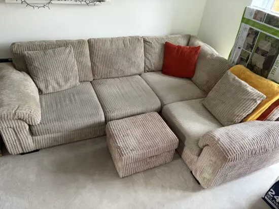 Large corner sofa and footstool