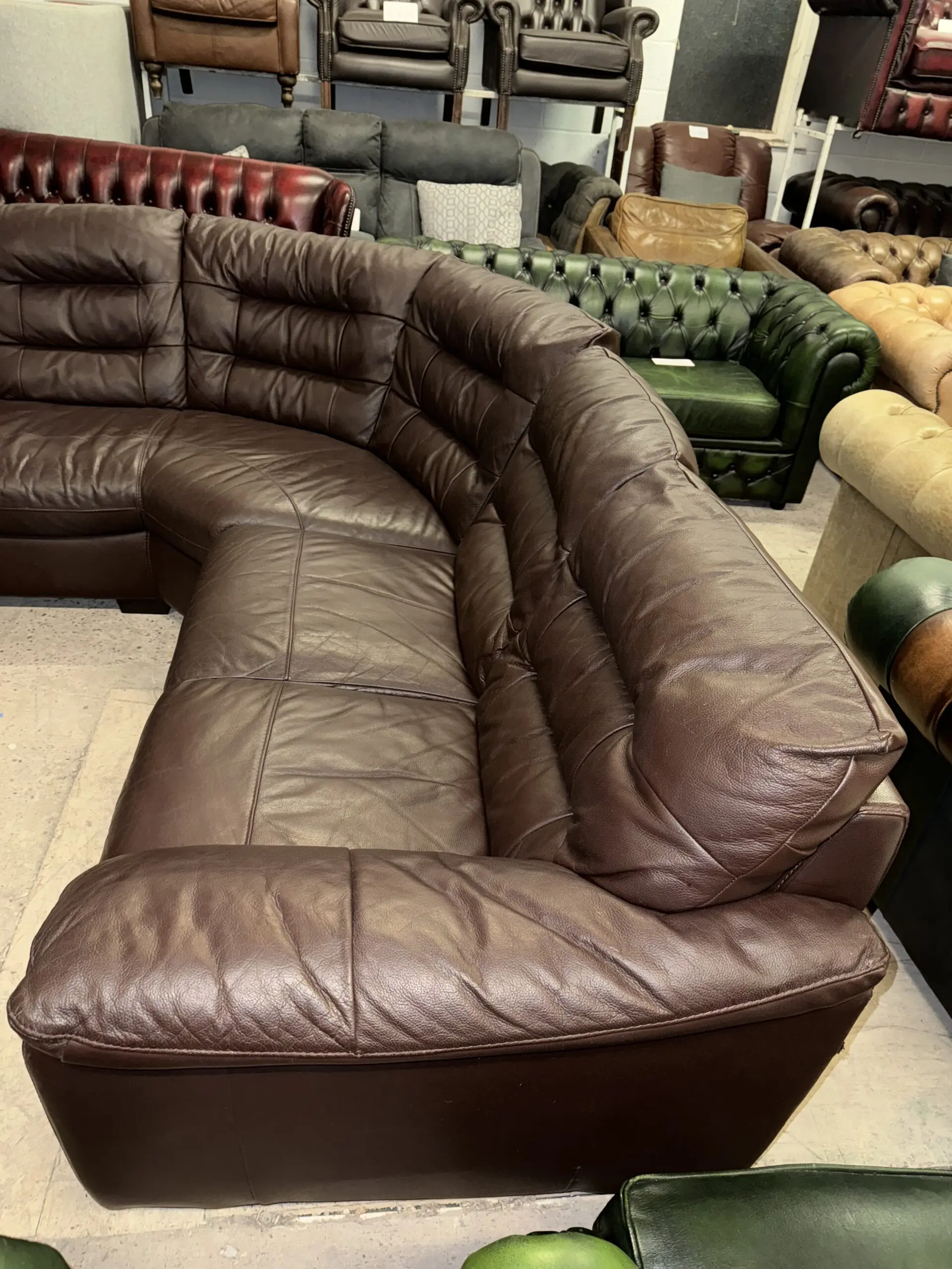 DFS Brown real leather corner sofa in 2 sections