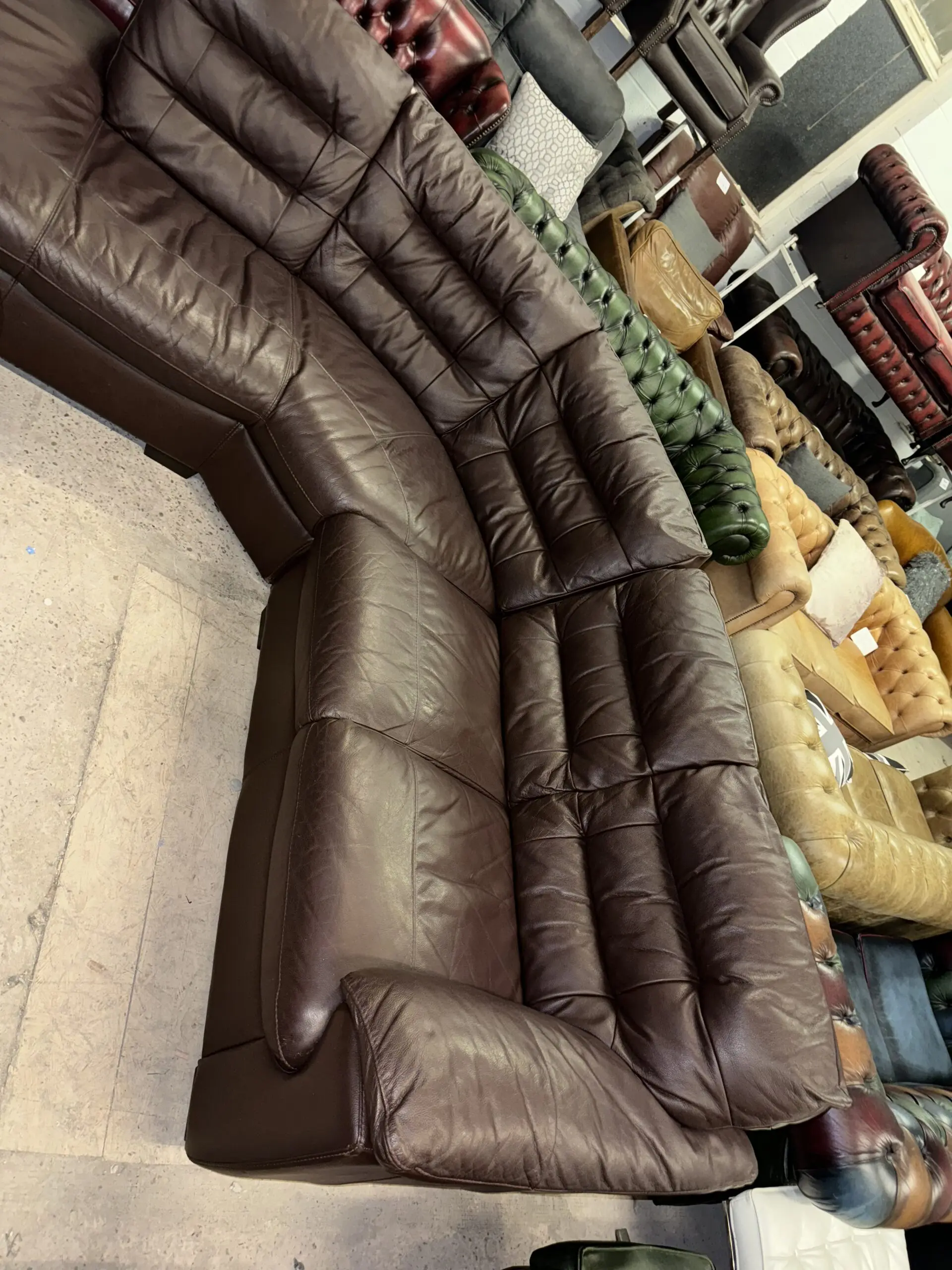 DFS Brown real leather corner sofa in 2 sections