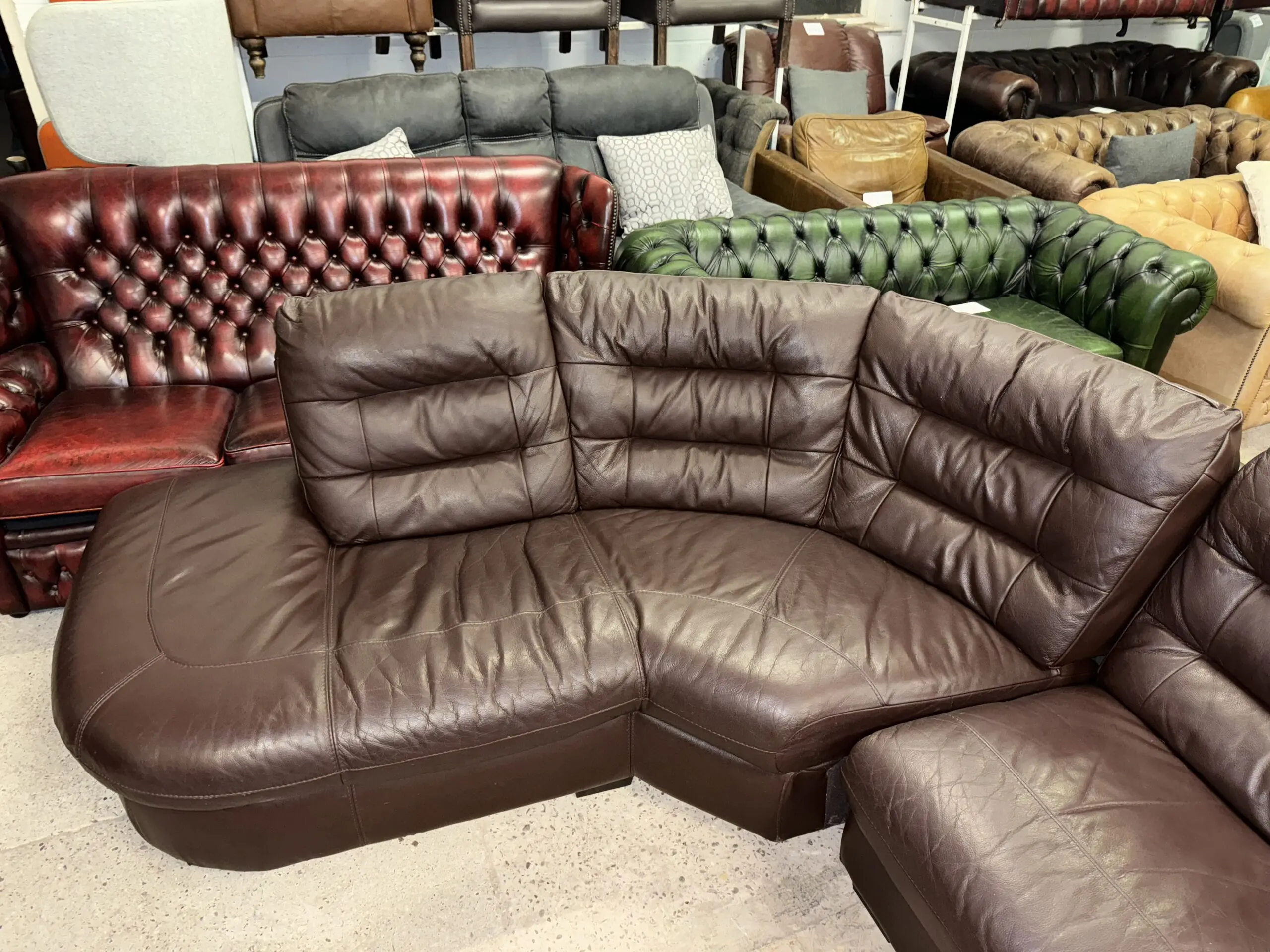 DFS Brown real leather corner sofa in 2 sections