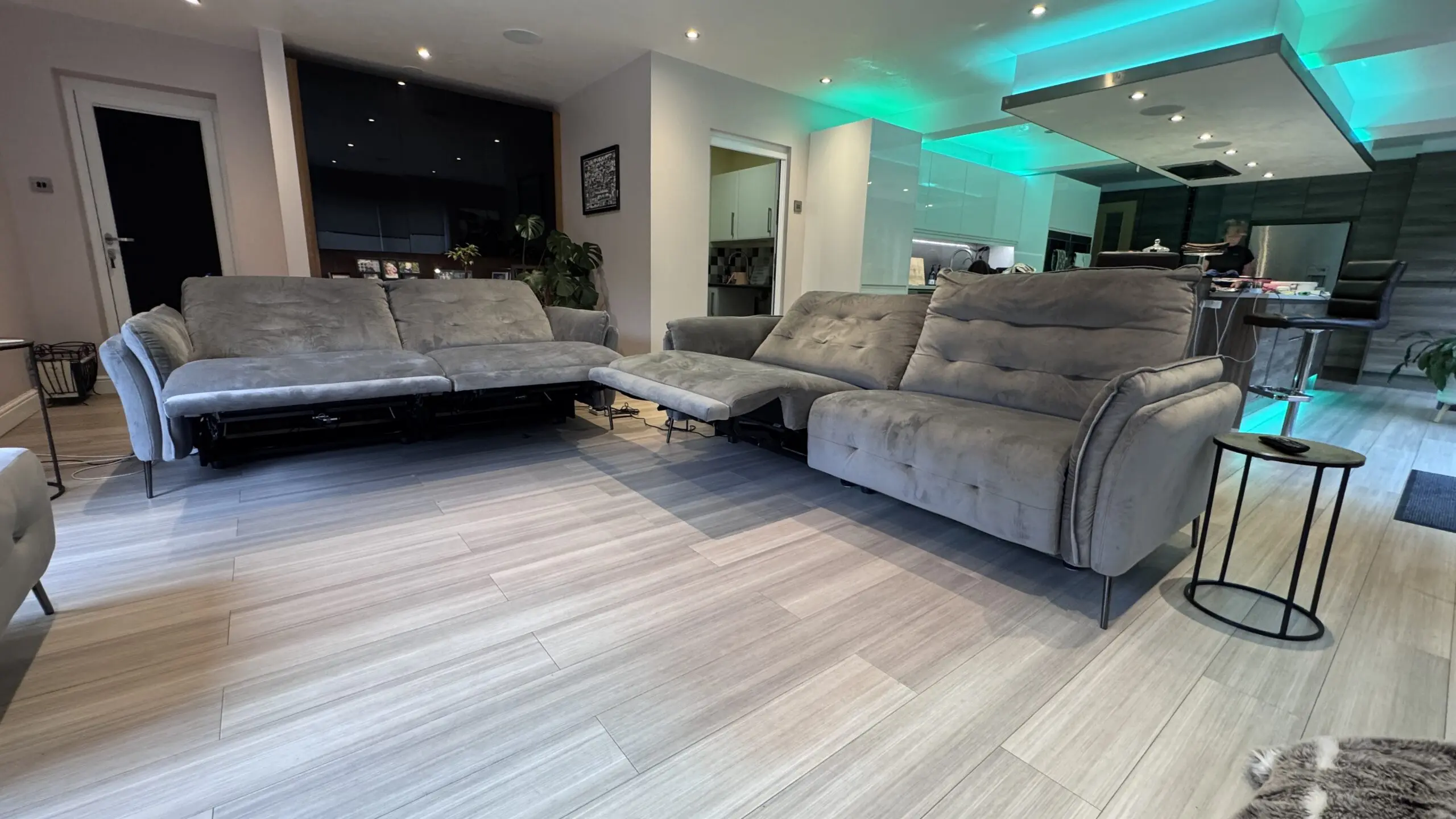 Two Large electric reclining sofas & footstool