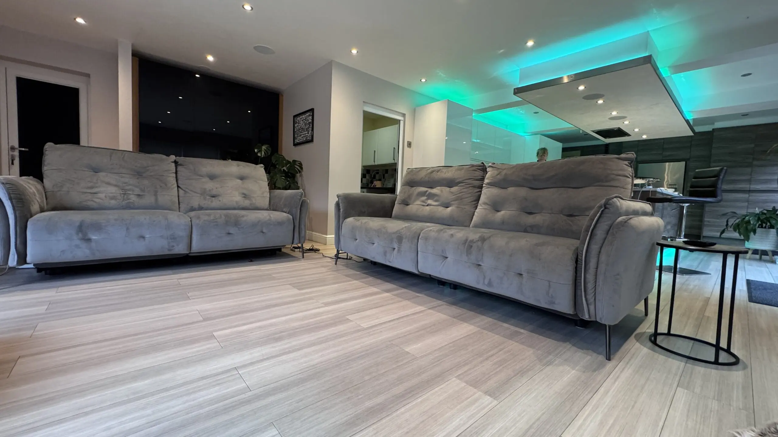 Two Large electric reclining sofas & footstool