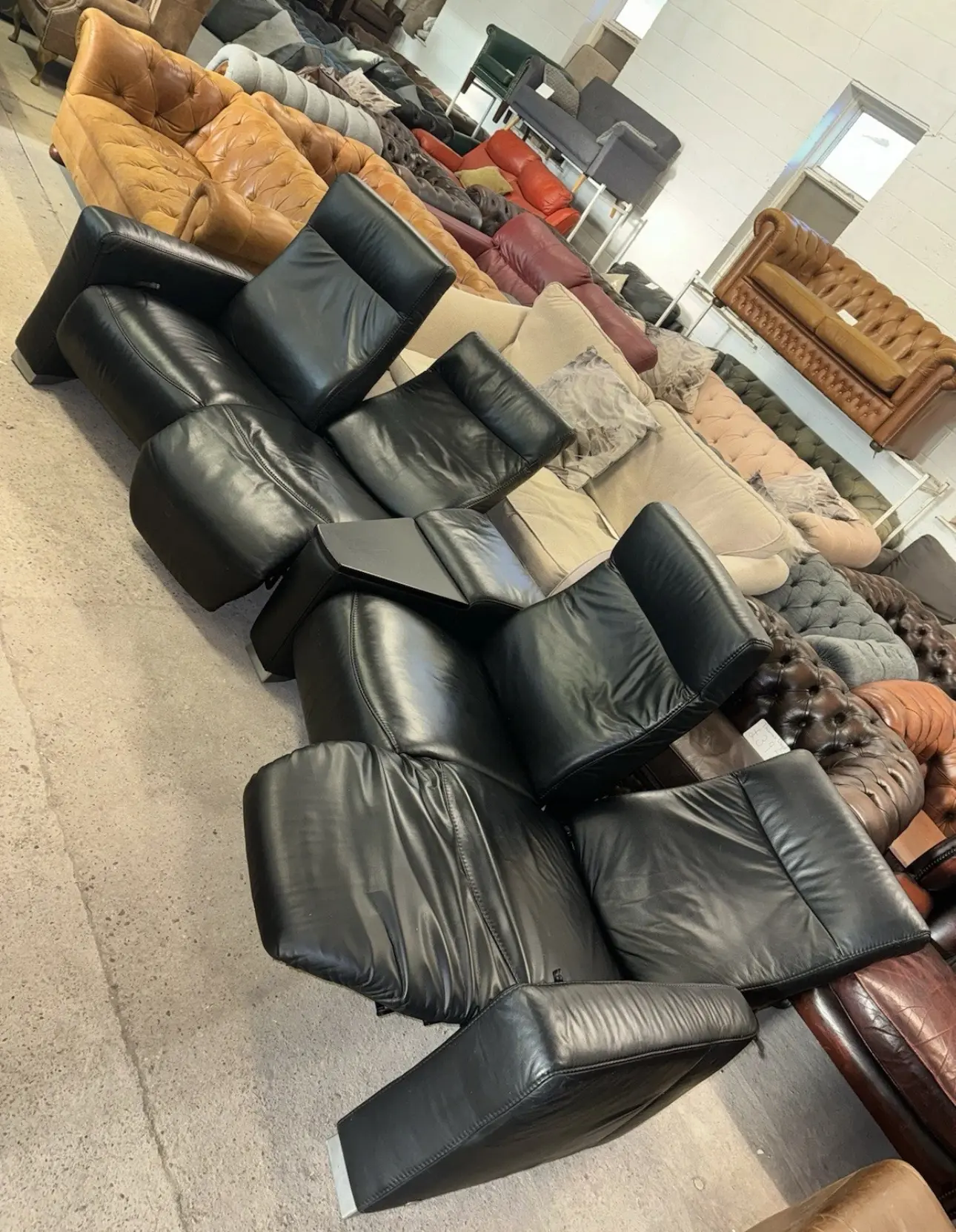 Himolla black real leather reclining cinema set four seater sofa