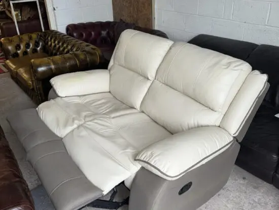DFS Cream real leather manual recliner two seater sofa