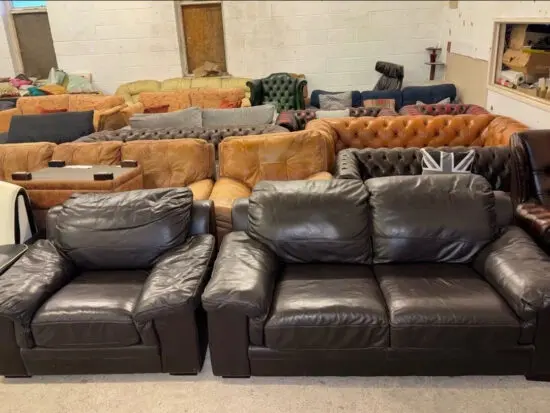 DFS Dark brown real leather two seater sofa with armchair
