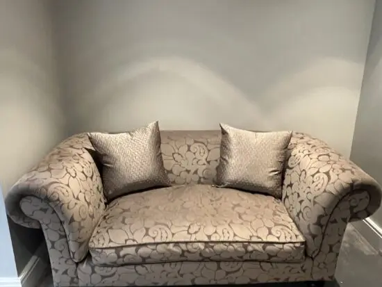 Dark grey bespoke made Delcor large two seater sofa. Chesterfield style.