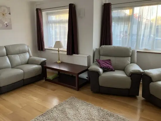 DFS Grey Leather reclining sofa and two chairs