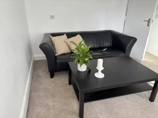 3-seater black leather sofa