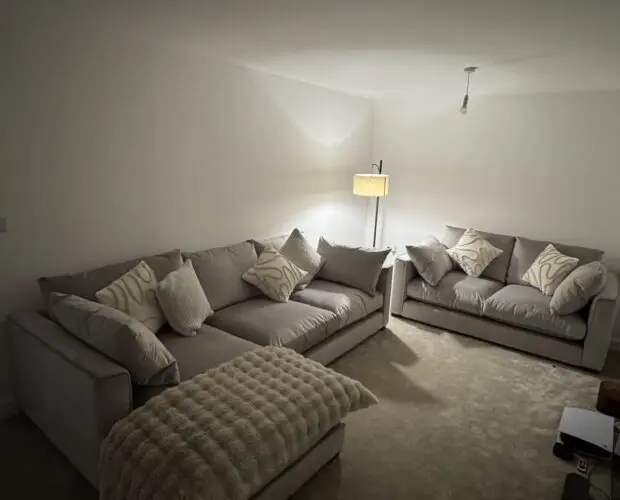 DFS grey kaizer chaise sofa and pouffe