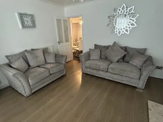 Like New Modern studded sliver/grey sofas