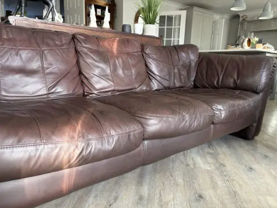 DFS dark brown leather 3 seater sofa