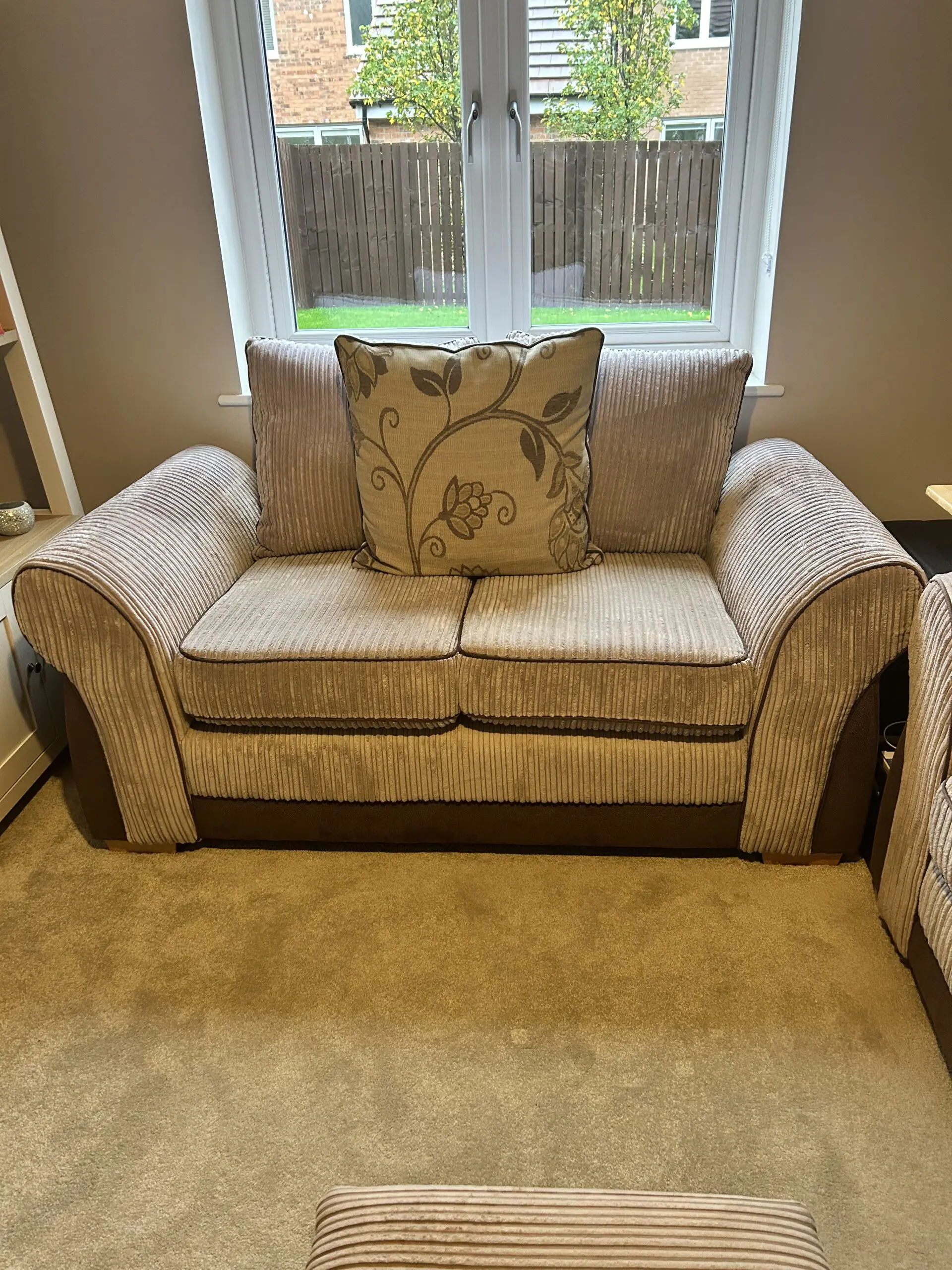 Beige and brown cord sofa with scatter back