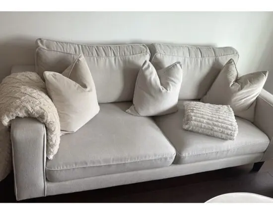 Cream three seater and lovechair armchair