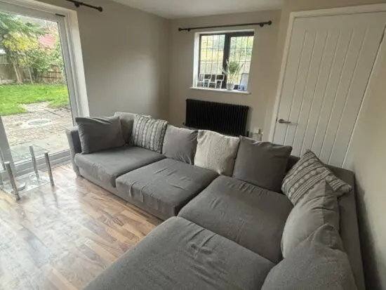 DFS grey corner sofa used can split into 2 parts with inc scatter cushions