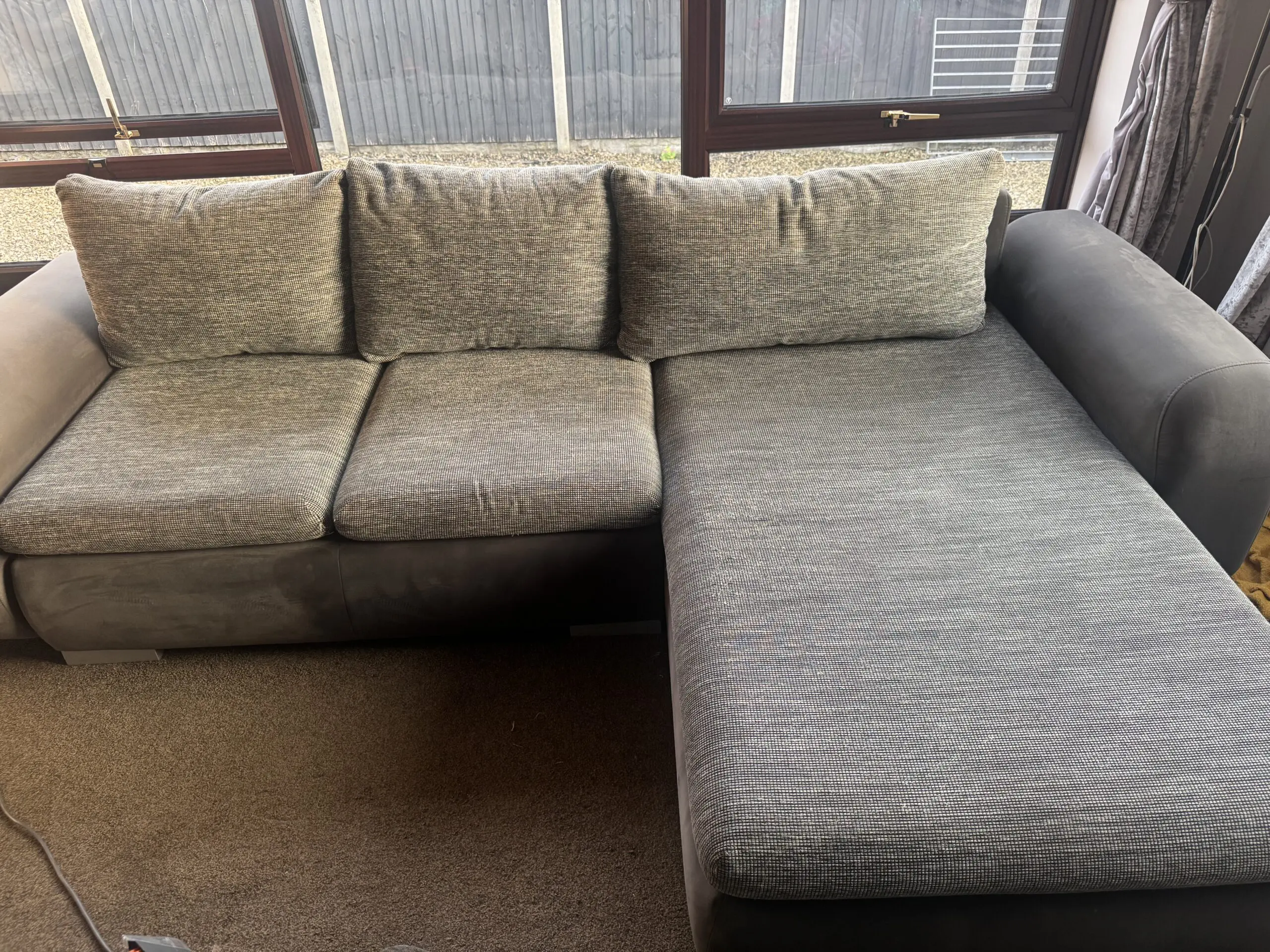 Grey corner sofa bed with storage