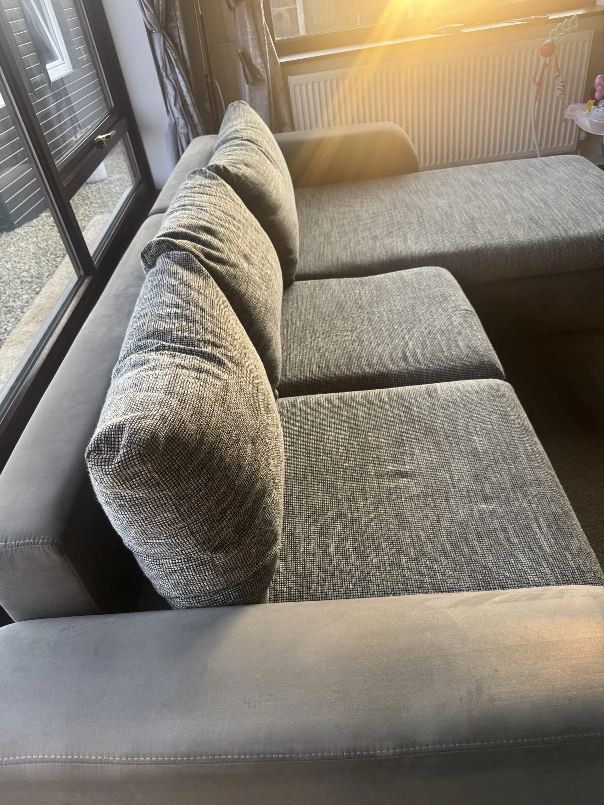 Grey corner sofa bed with storage