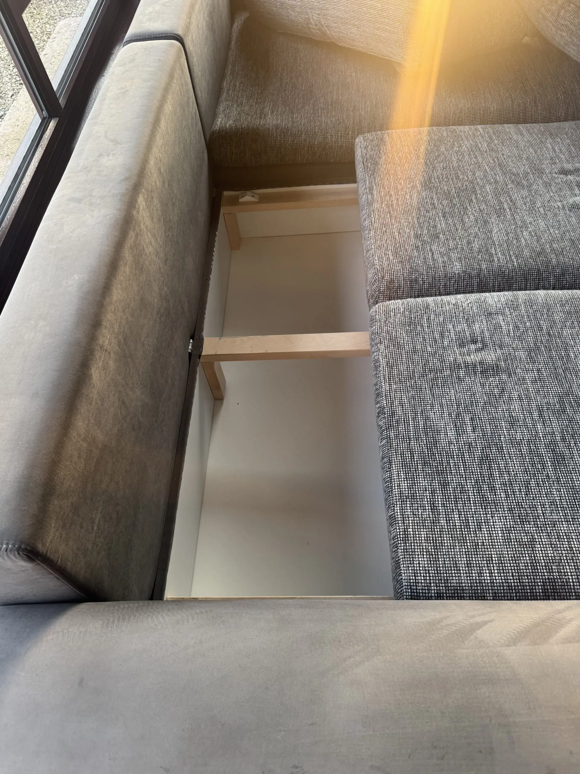 Grey corner sofa bed with storage