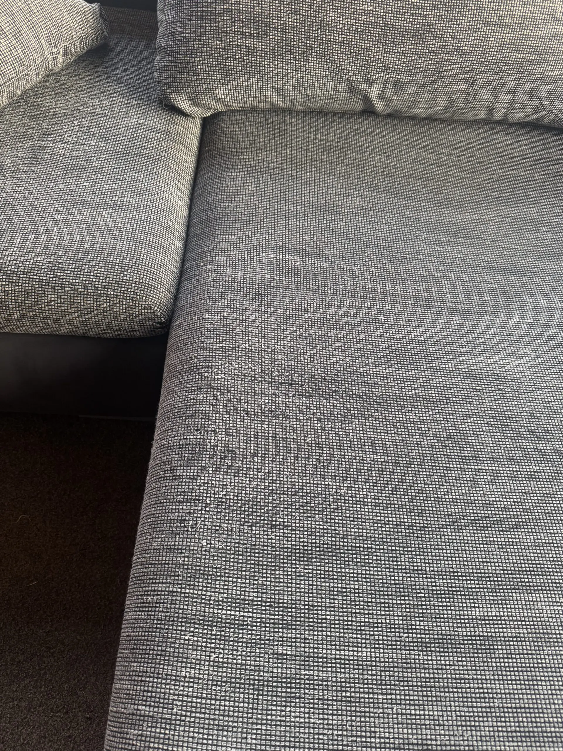 Grey corner sofa bed with storage