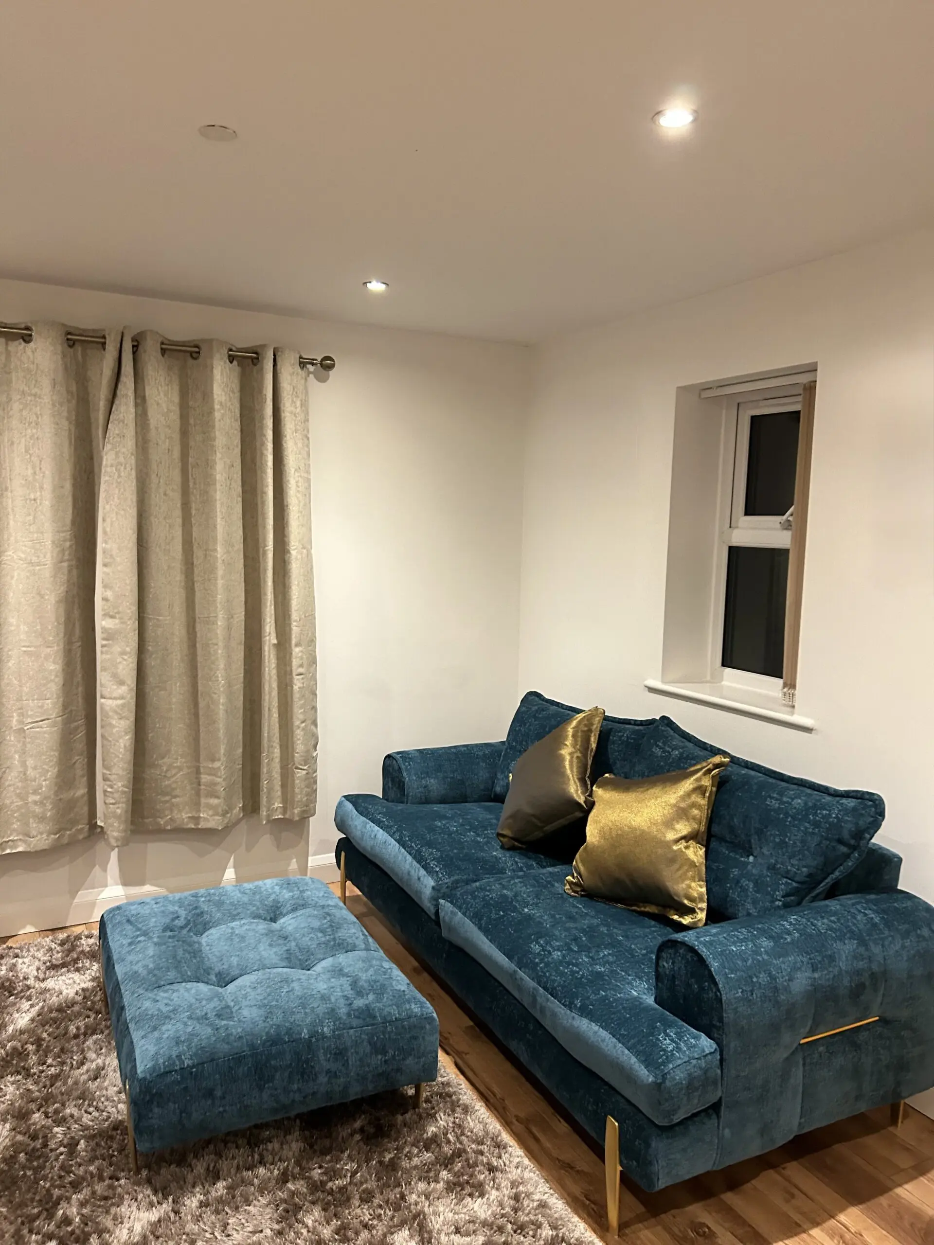 DFS 3 seater and footstool