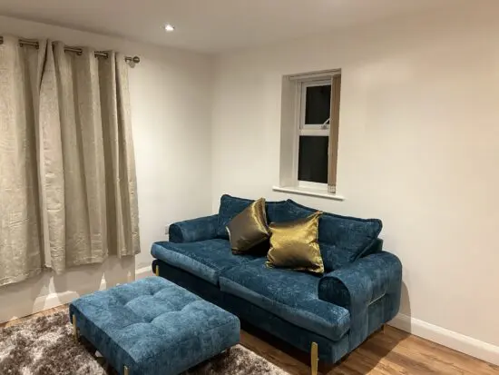 DFS 3 seater and footstool