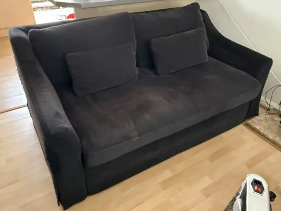 Black three seater sofa bed