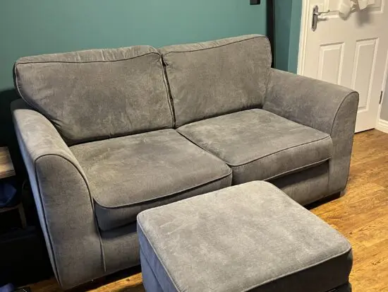DFS GREY SOFA BED WITH MATCHING FOOTSTOOL