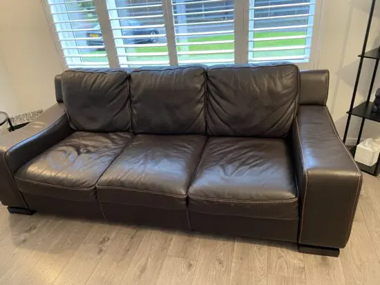 BROWN LEATHER SETTEE
