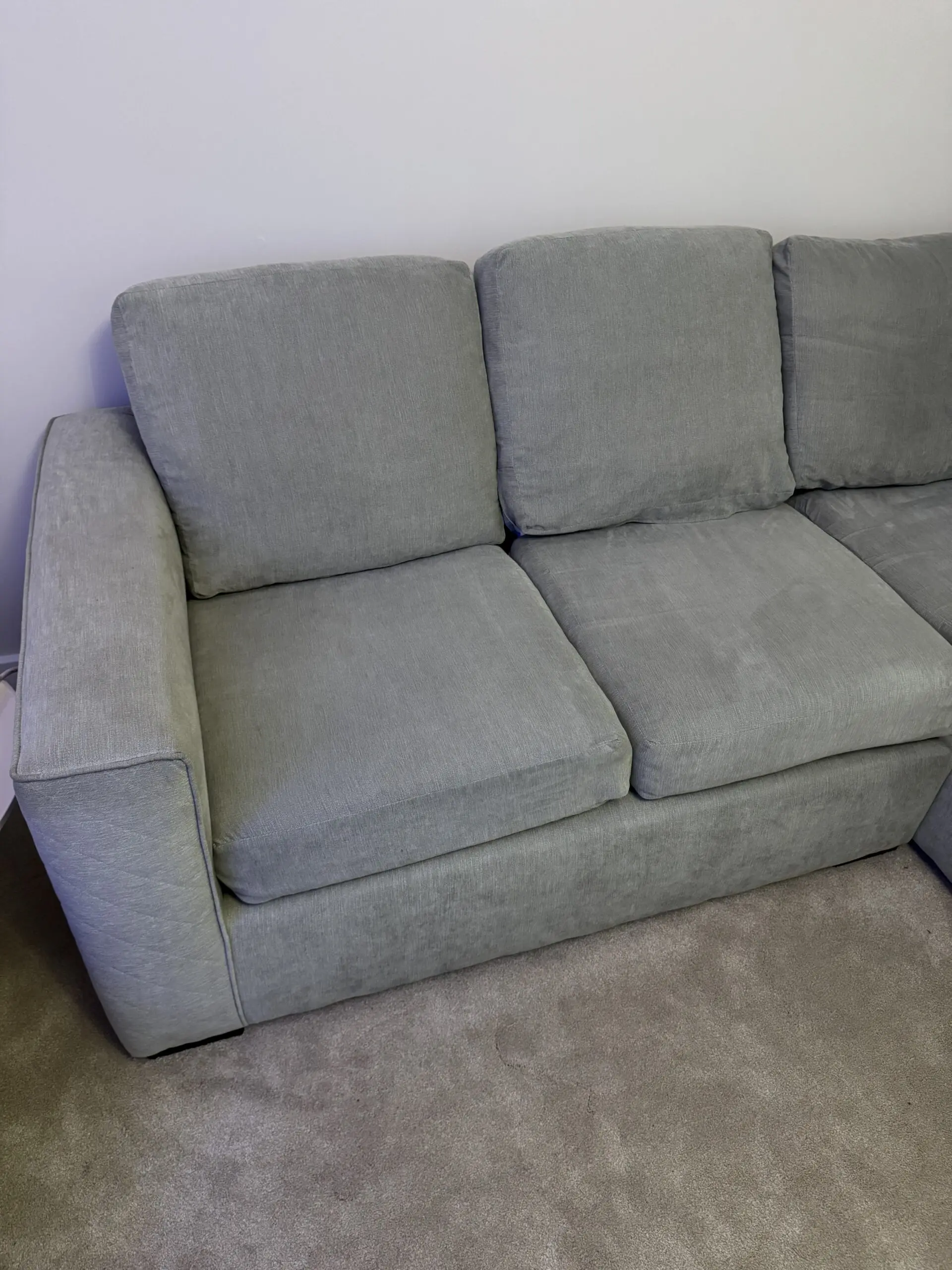 Grey L corner sofa with swivel chair and foot stall