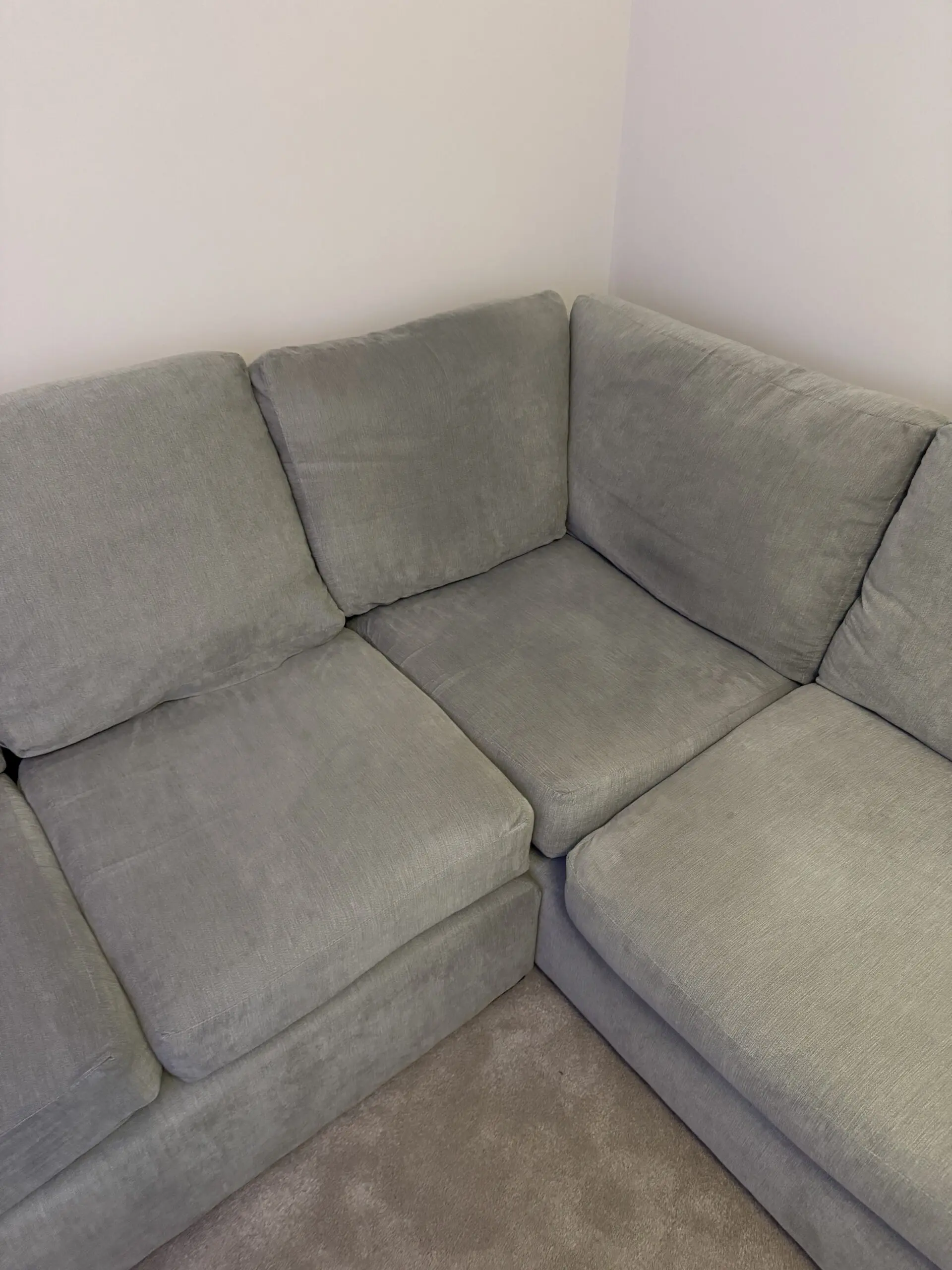 Grey L corner sofa with swivel chair and foot stall