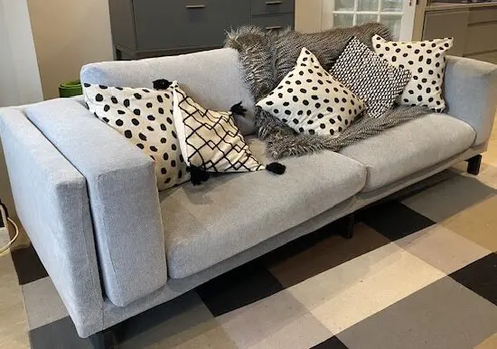 Pale grey IKEA Nockerby couch