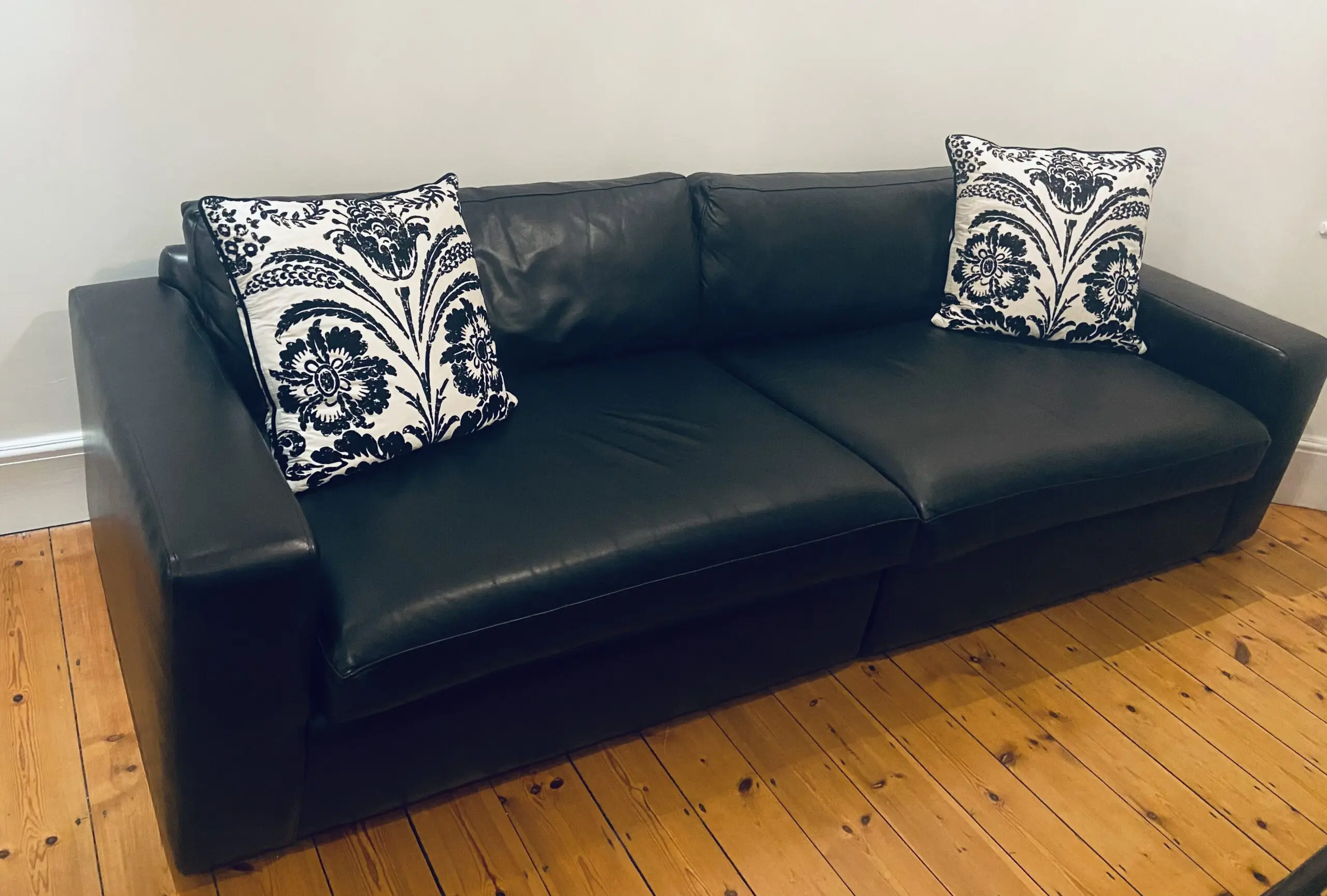 Extra Large Bespoke Black Leather Sofa with cushions