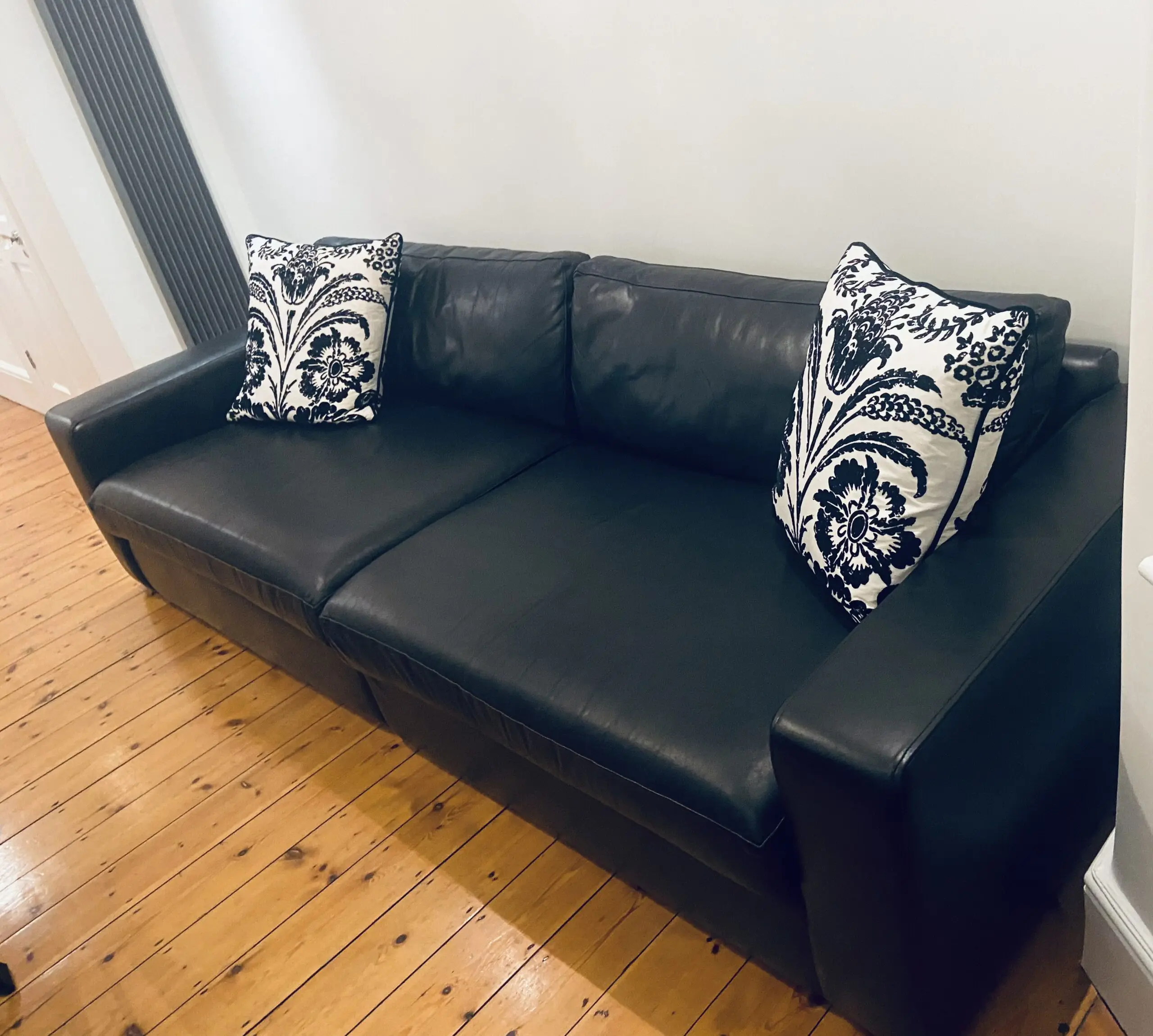 Extra Large Bespoke Black Leather Sofa with cushions