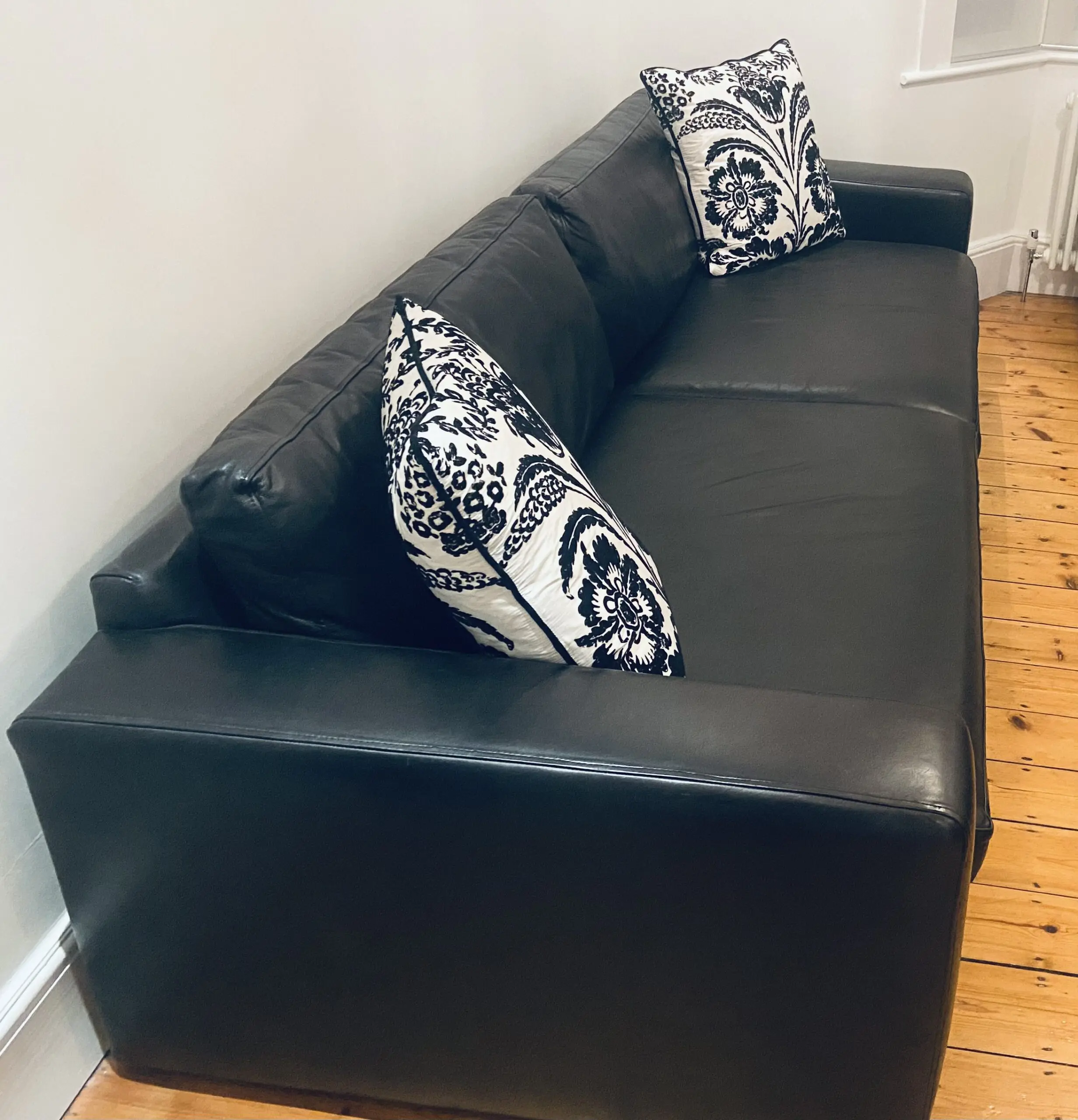 Extra Large Bespoke Black Leather Sofa with cushions