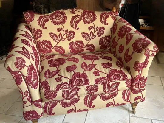 Duresta loveseat in cranberry & sand fabric
