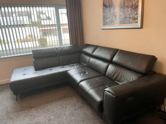 Darker grey corner sofa and matching chair