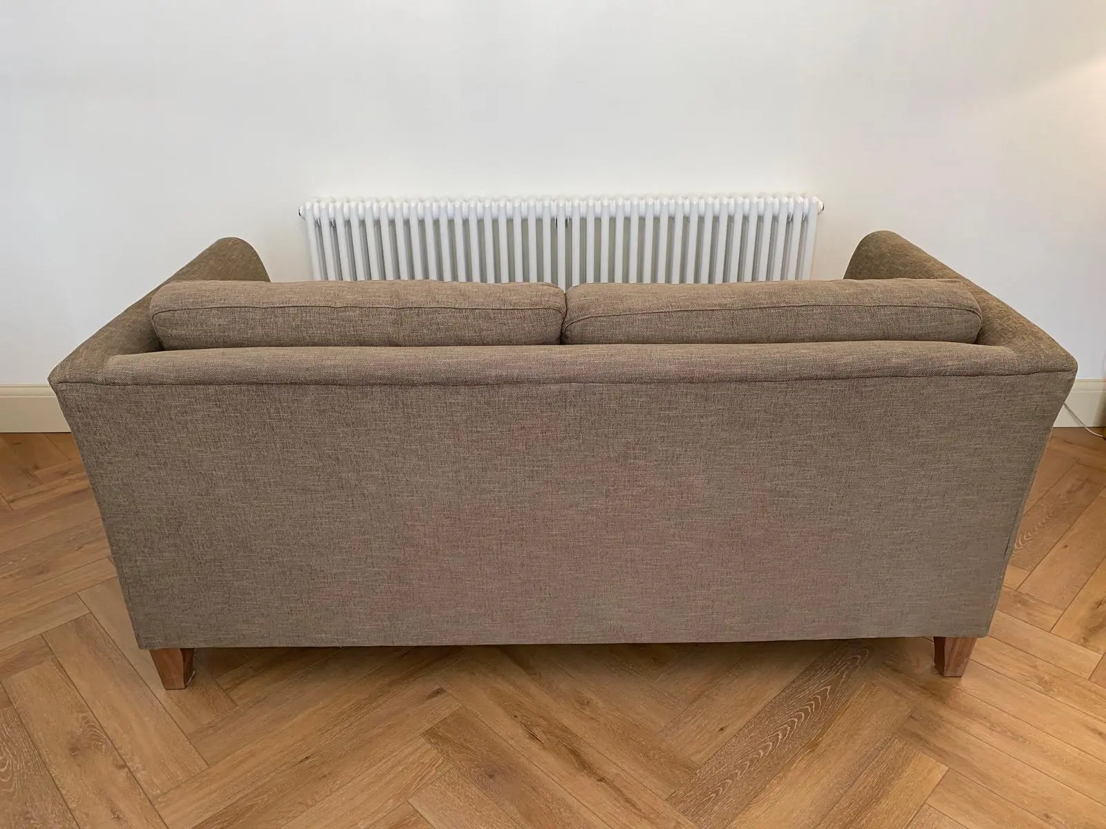 Two Large 2 Seater Sofas and Footstool By Nick Munro