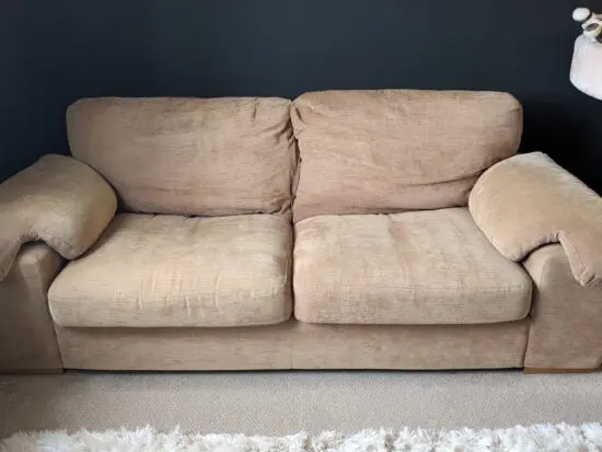 Brown three-seater sofa