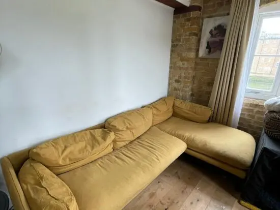 Yellow L-shaped sofa