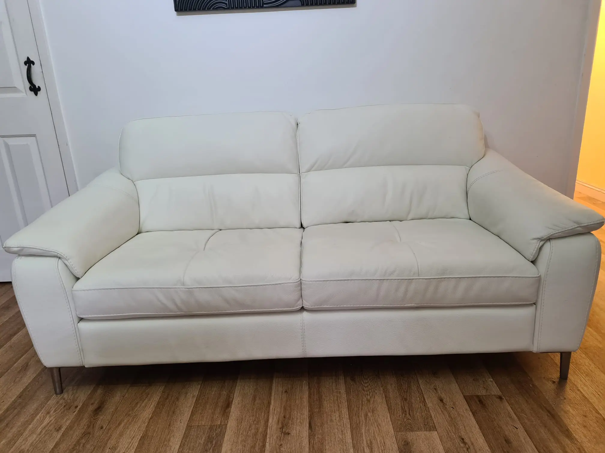 From Furniture Village, here are - Elegant White Leather Sofas – Set of Two (2-Seaters Each)