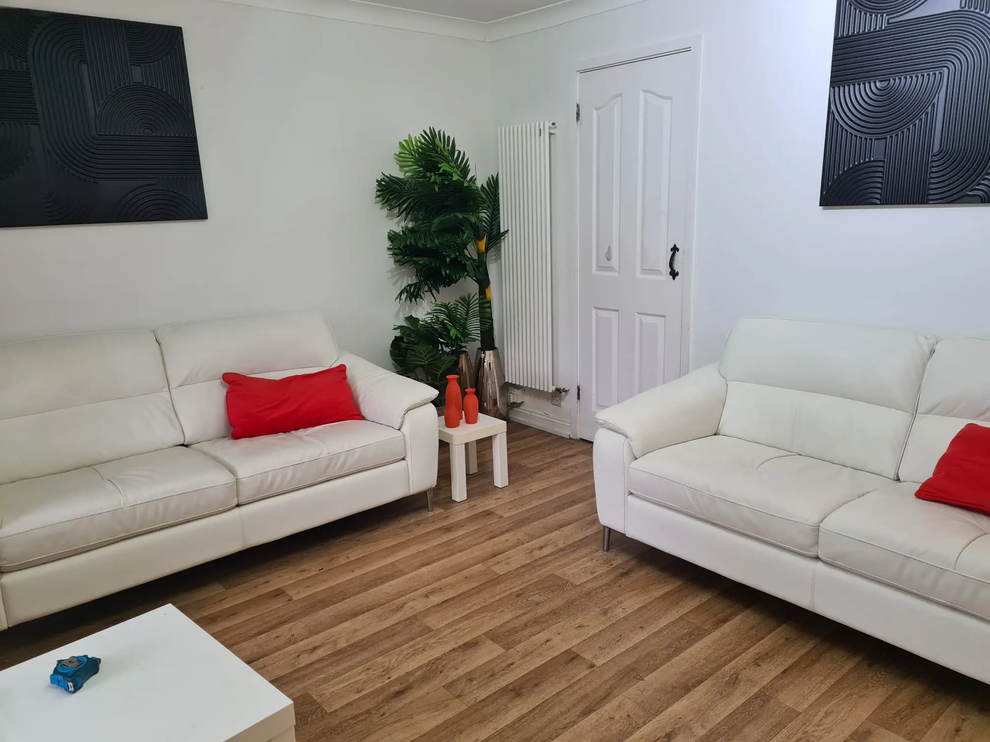 From Furniture Village, here are - Elegant White Leather Sofas – Set of Two (2-Seaters Each)