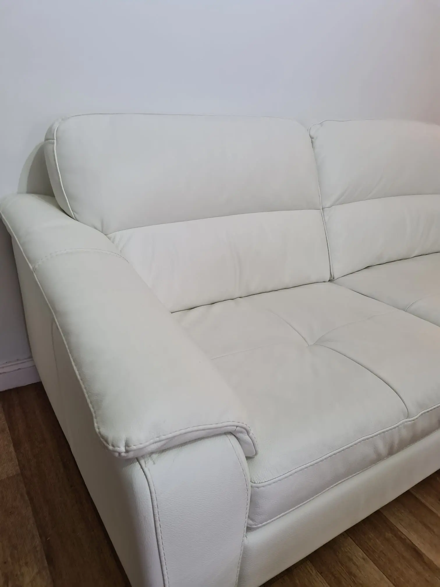 From Furniture Village, here are - Elegant White Leather Sofas – Set of Two (2-Seaters Each)