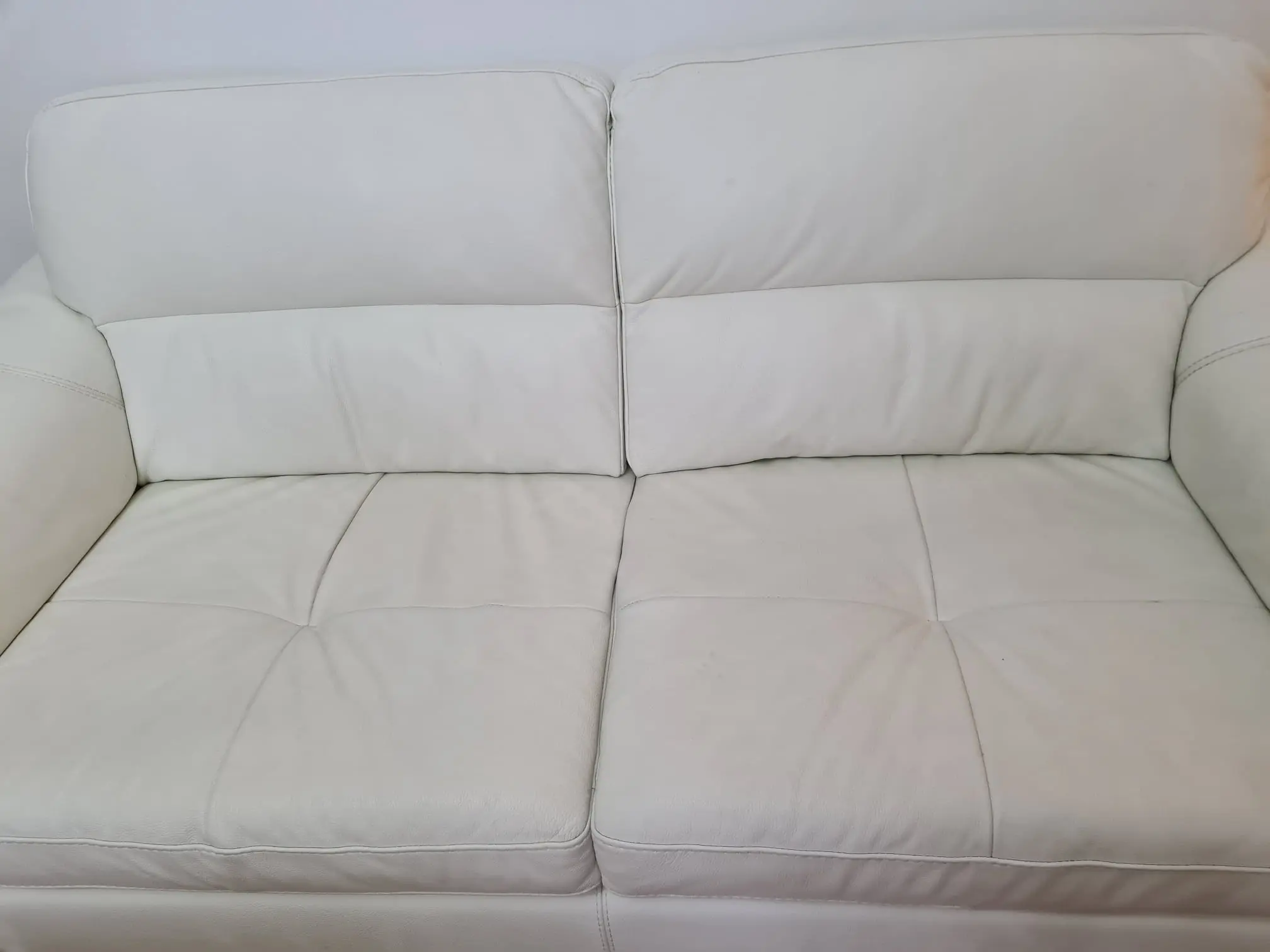 From Furniture Village, here are - Elegant White Leather Sofas – Set of Two (2-Seaters Each)