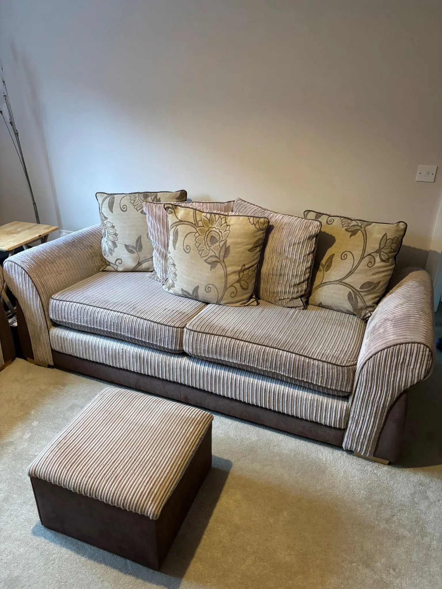 Beige and brown cord sofa with scatter back
