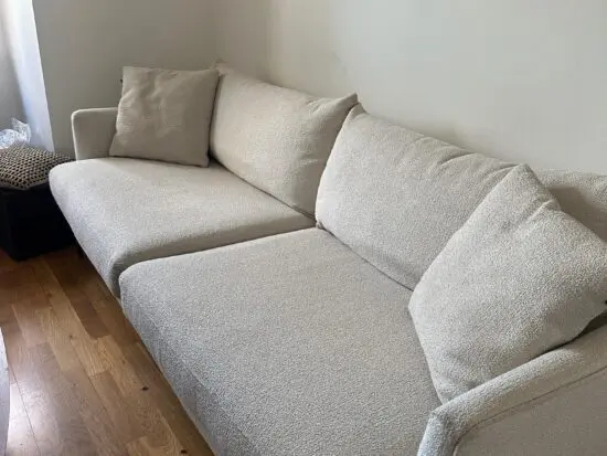 DFS Cream Boucle Sofa - 4 seater and Footstool