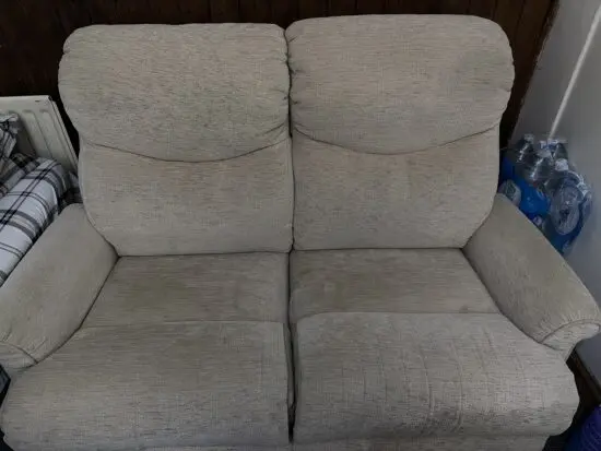 2 seater sofa and one recliner with cream coloue