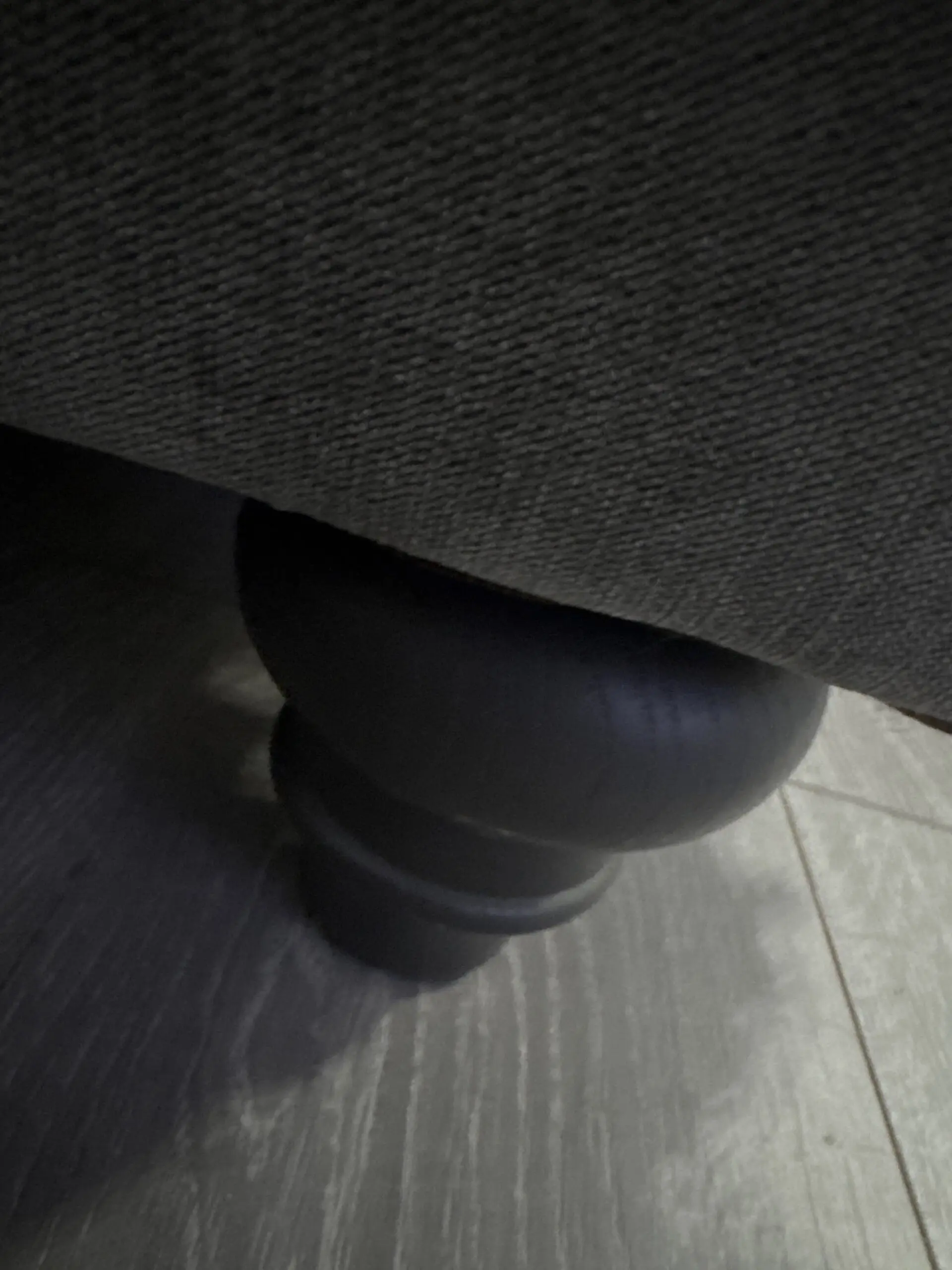 Large grey 4 seater tufted sofa and foot stool