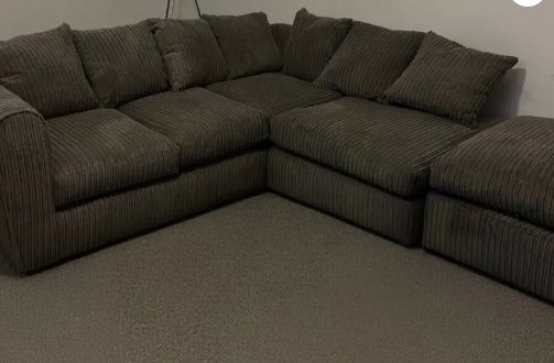 Grey corner sofa from Dunelm with Ottoman footstool