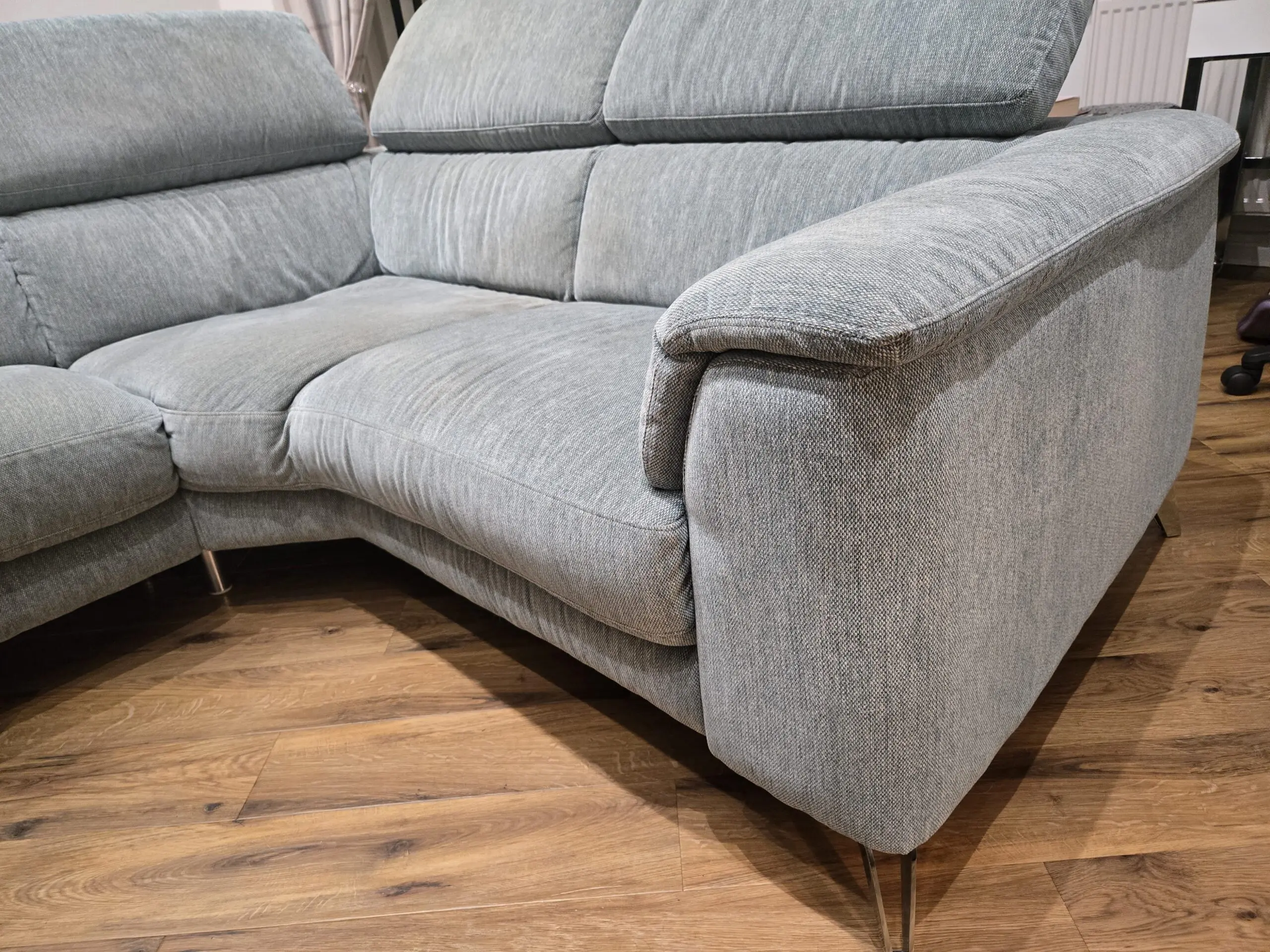 Left hand corner sofa in Teal, 4 seater with battery powered recliner plus footstool in same colour / fabric