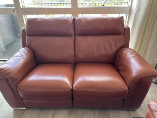 Furniture Village - Brown - 2 Seater Sofa in Excellent Condition with Power Recliner